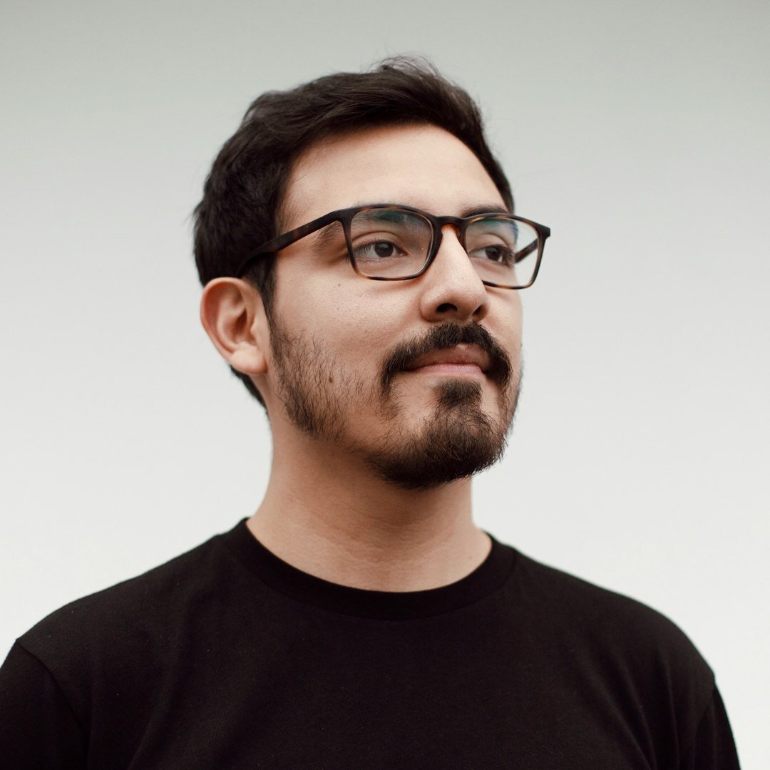 Experienced male trainer in glasses at a seminar