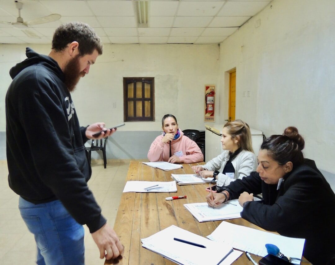 Trainer coaching a group of professionals in a training session