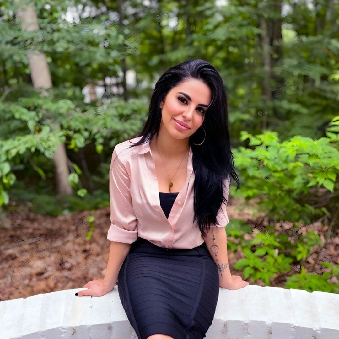 Professional Slovenian woman in business attire smiling confidently